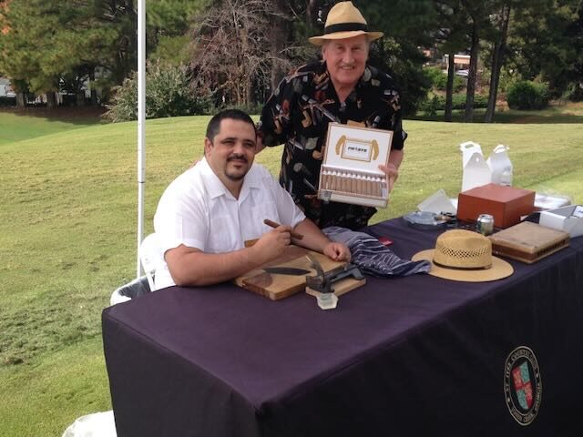 Joe and golfers enjoying cigars in the clubhouse