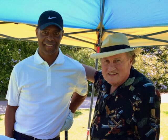 Joe with golfers enjoying cigars