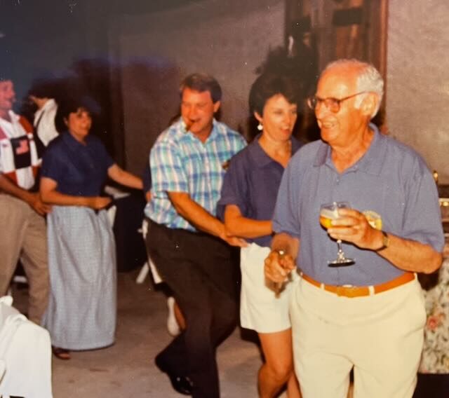 Joe with a guest at a formal event