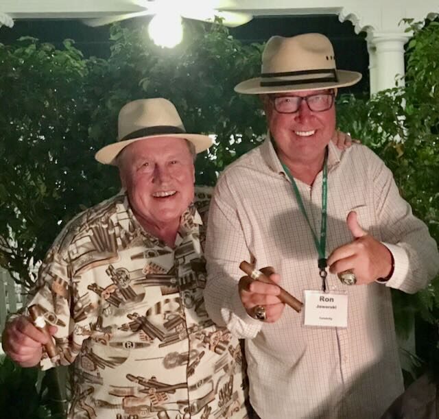 Joe with guests and a tournament trophy