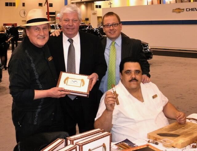 Joe with a guest at an evening event