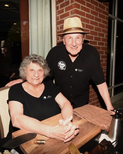 Joe and Elaine at the cigar table for an evening event